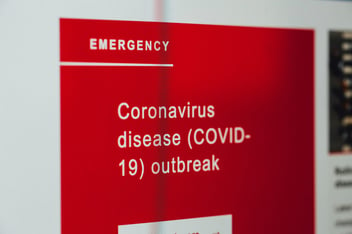 A flier indicating the emergency nature of COVID-19