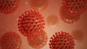 A CGI image of COVID-19 particles