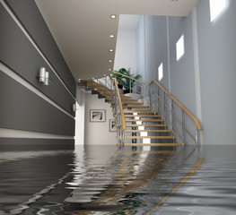 A flooded entry way to a home, with the main stairs half submerged in water.