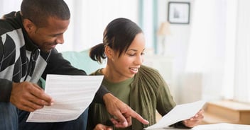 A public adjuster helps a client review their insurance claim