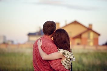 A couple looks at their home in Florida