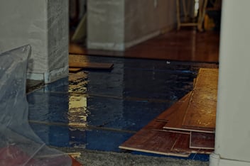 A home in Florida with it's wood flooring removed due to water damage